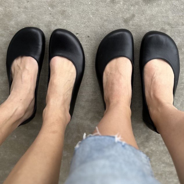 Two pairs of feet in Angles Fashion Ballet Flats. The left shows a slim regular width and the right shows a wider option. Both have anatomical shaped toe boxes and zero drop soles