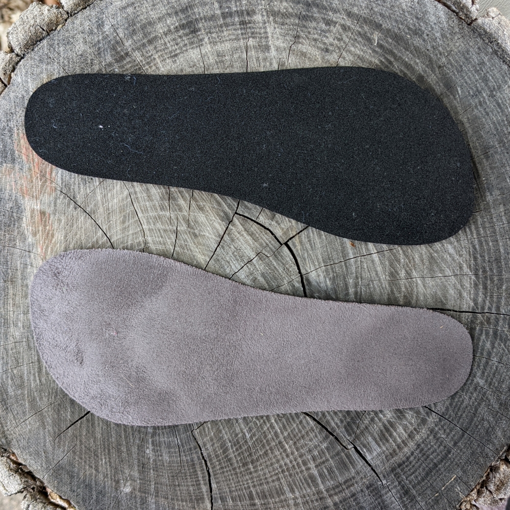 A pair of new and improved Be Lenka Kids Barefoot sneaker insoles