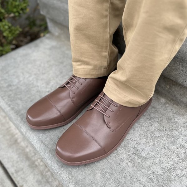 Front top down close up view of a man in khaki dress pants and barefoot dress shoes from Birchbury