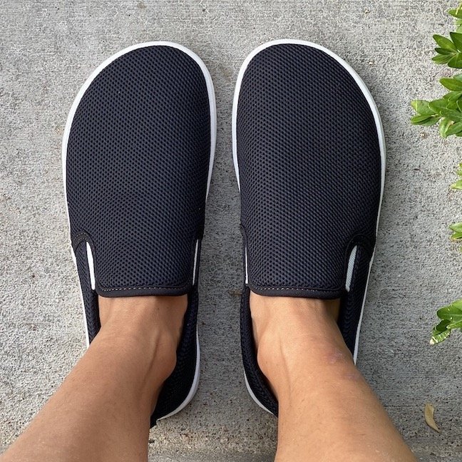 Top down view of Feelgrounds drop tops in black - vegan barefoot shoes with anatomical foot shape.