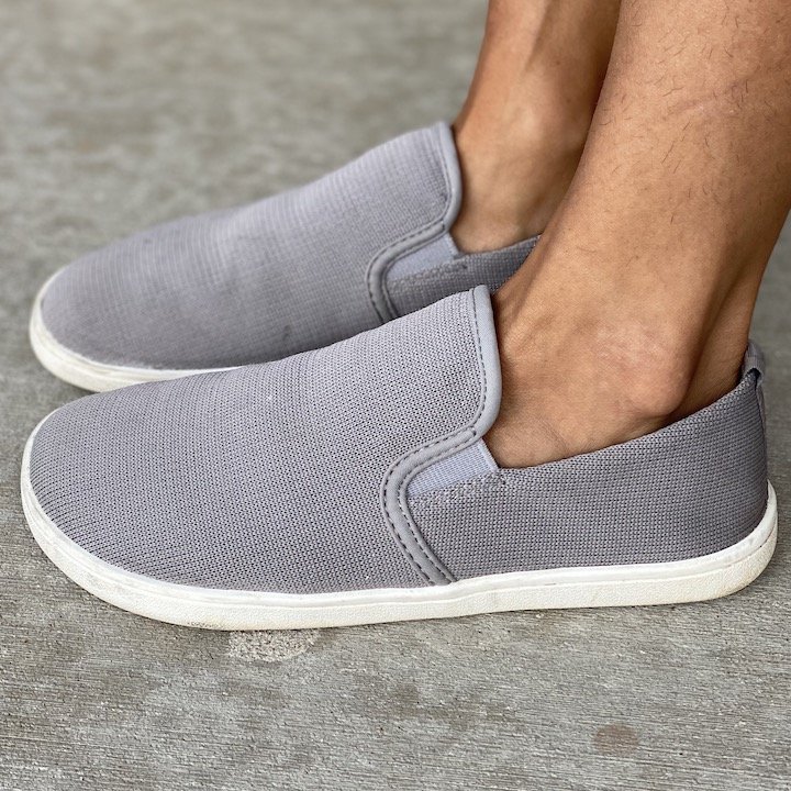 Side view of feelgrounds gray drop top slip ons