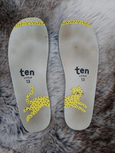 Foam Insoles with foot marks showing the animal print and size guide from Ten Little