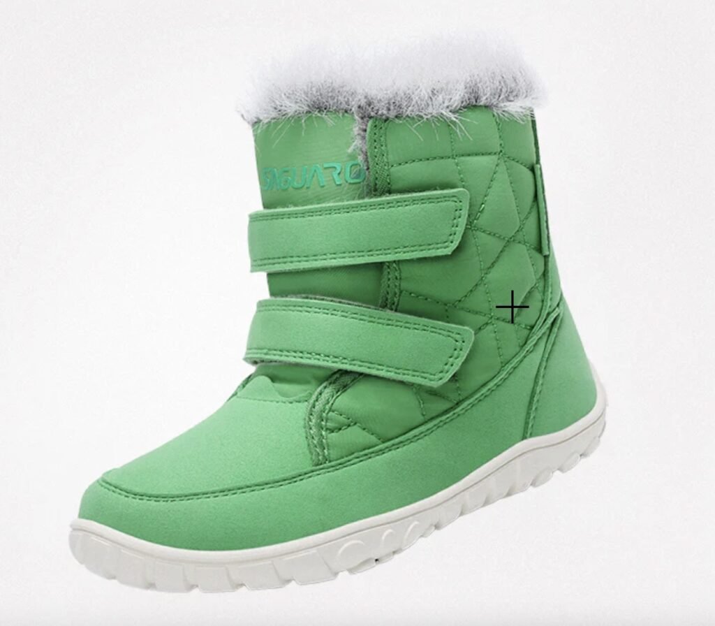 A product image of a green Saguaro kids barefoot winter boot with a wide toe box and white fuzz poking out the top and velcro straps