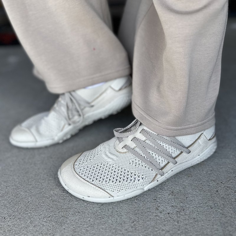 A focused look at the side of Lono Flow S barefoot sports gym shoes with a zero drop flexible outsole