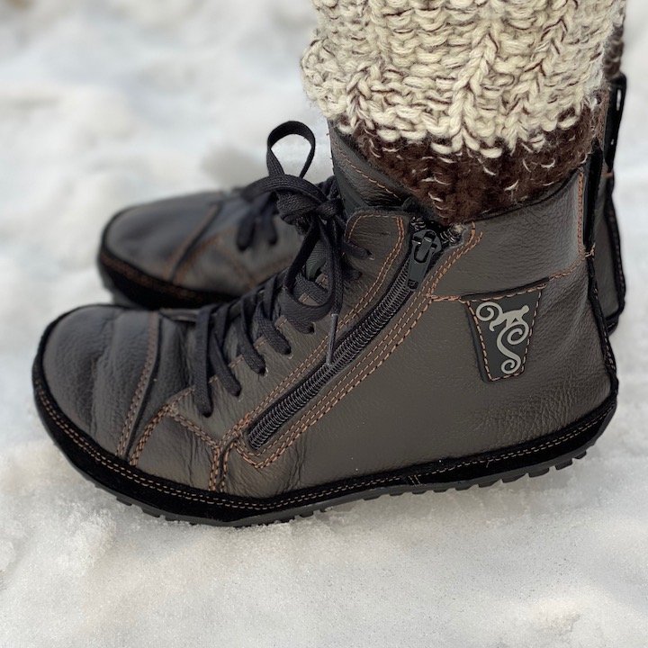 Close up side view of the Magical Alaskan side zipper barefoot flexible winter boots.
