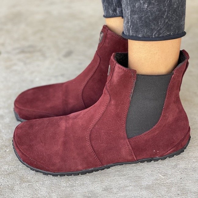 Close up side view of Magical Shoes Lupino Barefoot chelsea boots in deep red suede