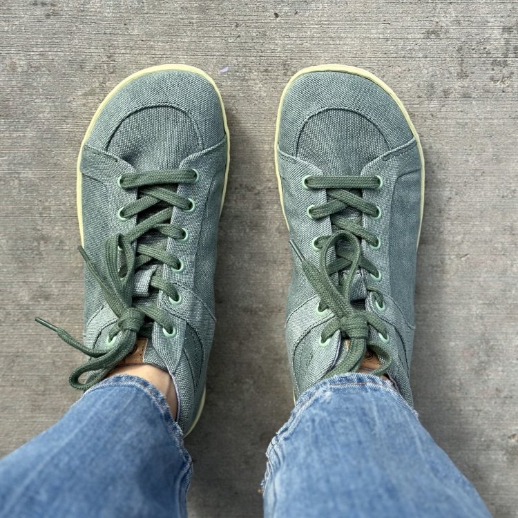Top down view of Adult Mukishoes Challenge blue green cotton sneaker with yellow outsole and wide toe box design