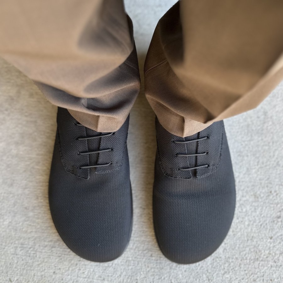 Top down close up of Oaka Studio knit mens dress shoes with a wide toe box