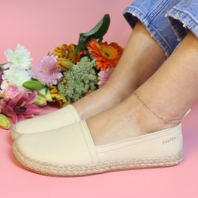 Side close up of a woman's feet in Shapen Barefoot Playa, a zero drop wide toe box espadrille style shoe
