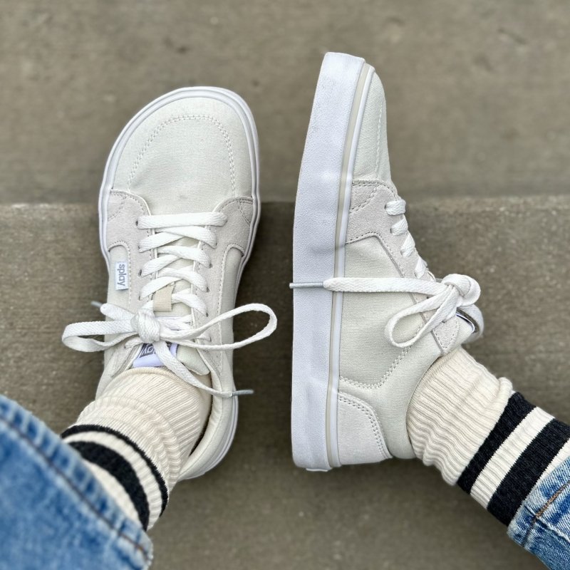 Top down and side profile of a pair of Splay Rev LT wide toe box skate shoes in all white canvas. The wide toe box and thick but flat sole are easily visible.
