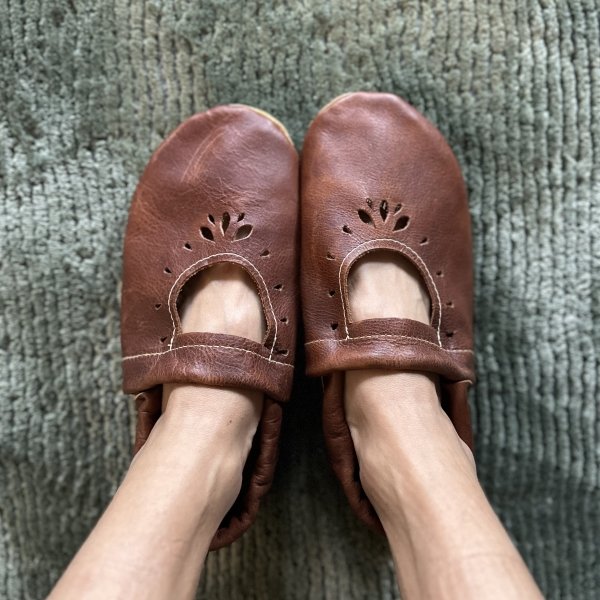 Top down photo of Starry Knight Design leather handmade women's house slippers