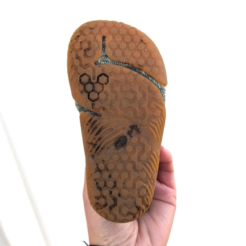 Outsole view showing the wide toe box foot shape of Vivobarefoot new walker barefoot shoes