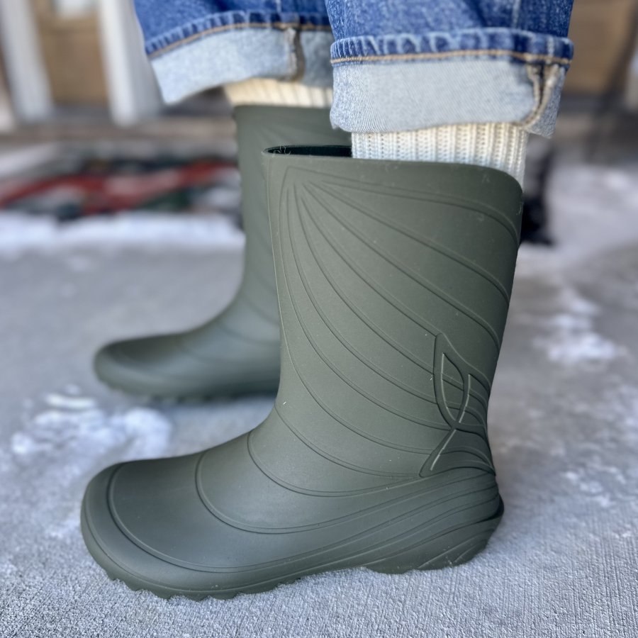 Side view of zero drop Wildling Shoes rubber rain boot in olive green