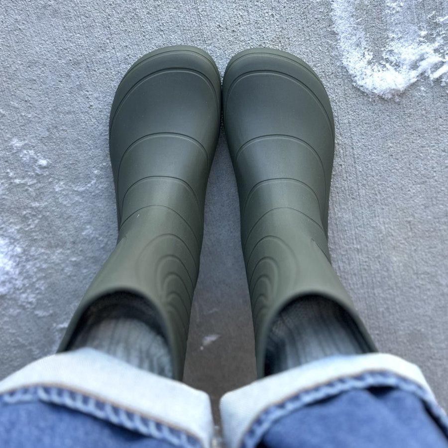 Top down close up of the wide toe box rain boots from Wildling Shoes in olive green