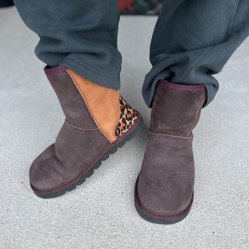 A pair of handmade sheepskin boots from the UK shown in brown, tan, and leopard