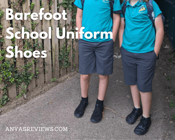 Two children shown from the neck down wearing school unforms and black barefoot shoes. The text reads Barefoot School Uniform Shoes Anya's Review Dot Com
