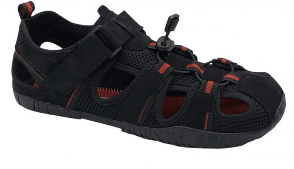 A black barefoot kids sandal with mesh fabric top and rubber soles shown on a white background