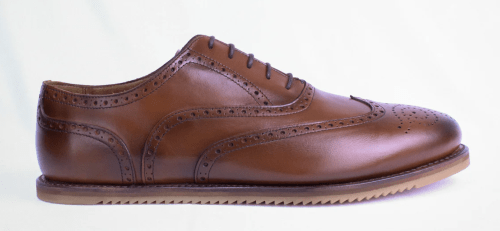 Stock side profile photo of Free Form Shoes zero drop wingtip mens dress shoes inspired by barefoot design