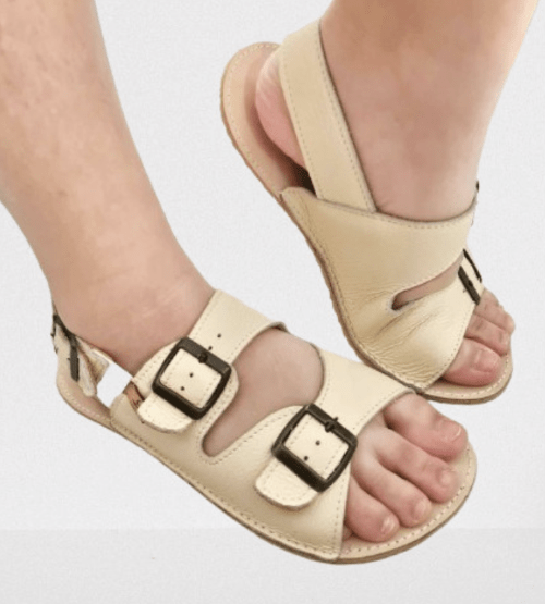Tomar Creations buckle sandals being worn by someone flexing their back foot