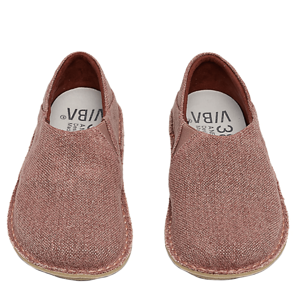 Front view of a pair of linen slip on clogs from Vibae, with removable supportive insoles and a natural shaped toe box
